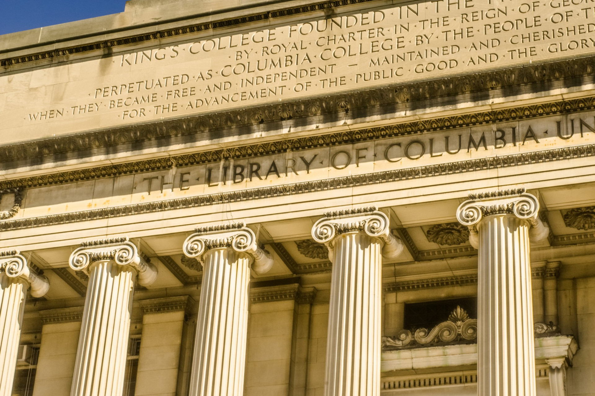 Front of Low Library, showing engravings on the facade.